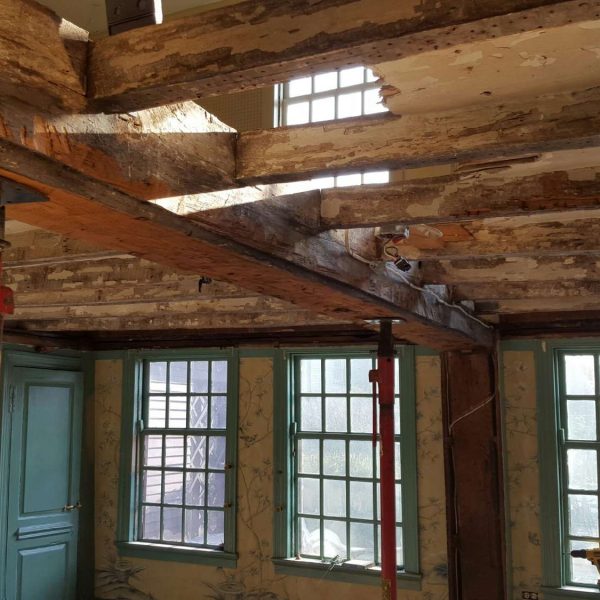 photograph of of structural members that were on view during the structural restoration of the summer beam at The House of the Seven Gables in 2016.
