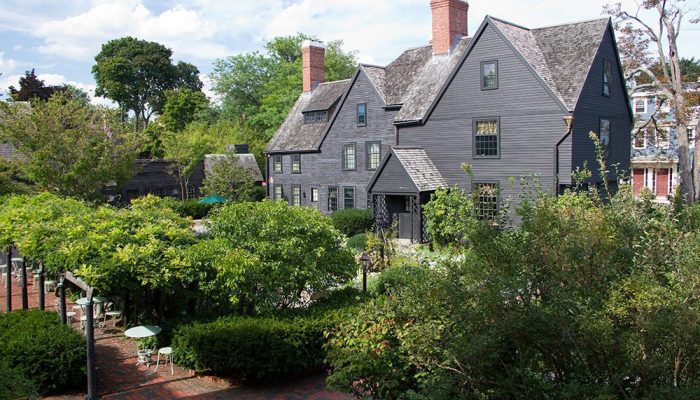 View of the House of Seven Gables from the Garden on a sunny day.|Mass Humanities Logo