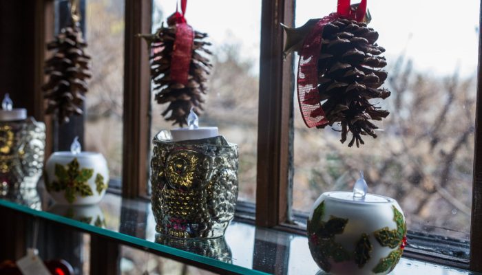 Pinecones and candleholders for sale in the gables museum store