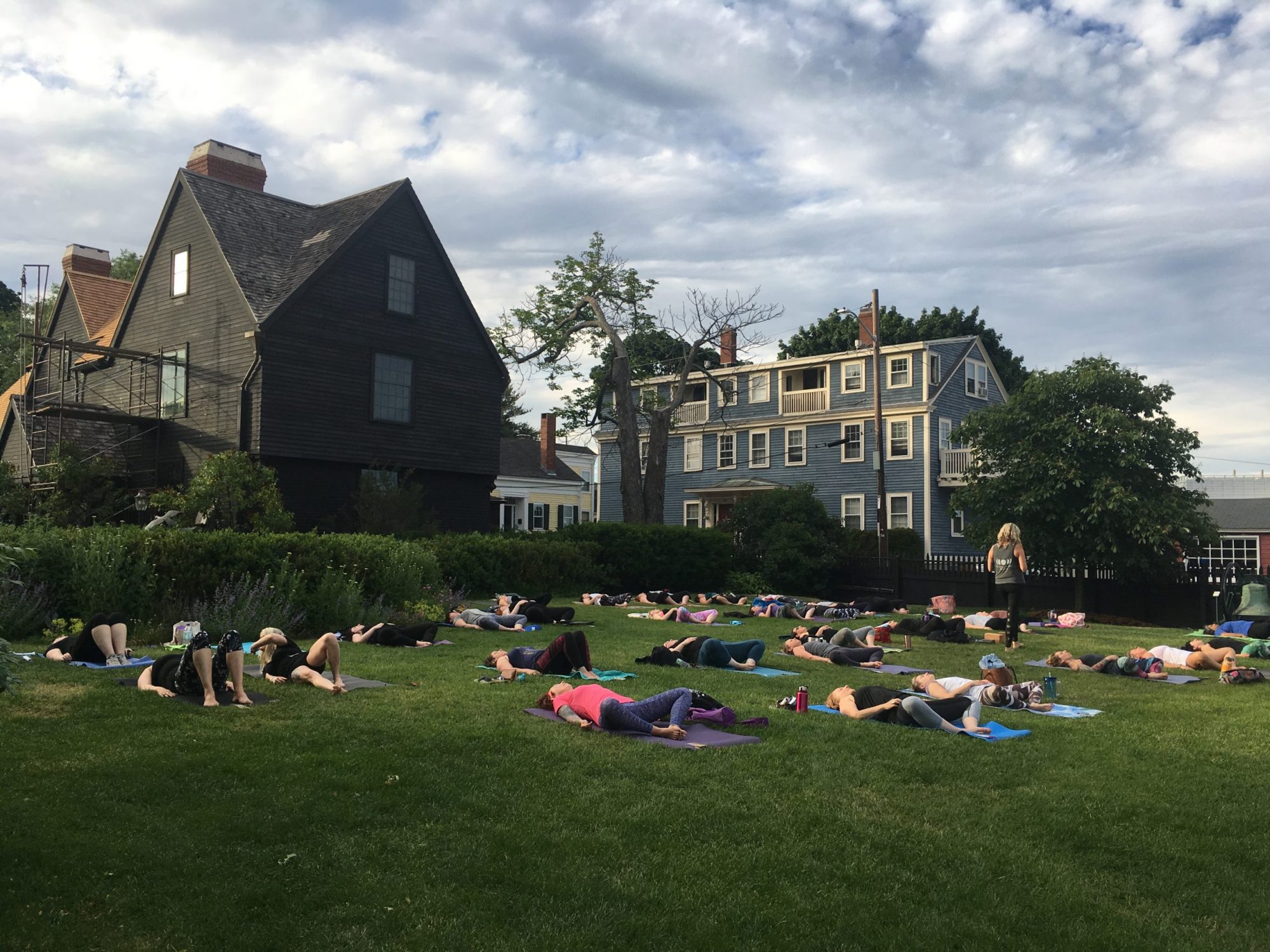 Yoga practice on the Seaside Lawn at The House of the Seven Gables