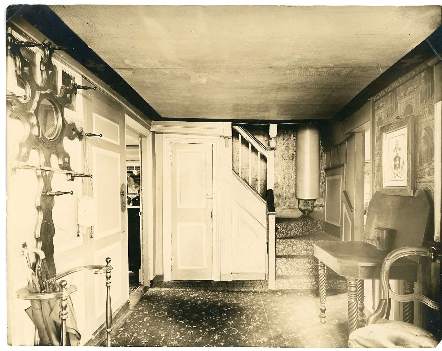 A black and white photograph of a stairwell and hall.|A black and white photograph of a stairwell and hall.|A black and white photograph of a stairwell and hall.