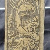 The cover of a book with black and white illustration of two children watching spiders descend through smoke.|An open book with the inscription "T.A. Appleton"|A green spine cover of a book.