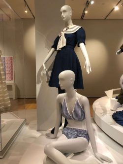 Photo of bathing suits from two different time periods on display at the Peabody Essex Museum.