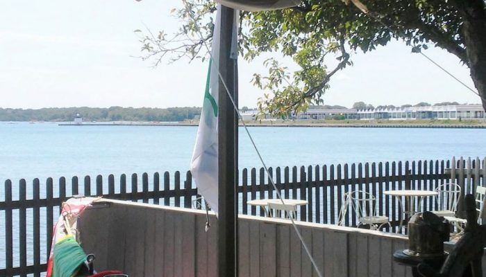 Raising the sail at Kids Cove at The House of the Seven Gables