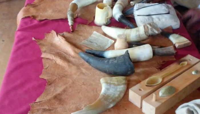 Horn working hands-on history program at The Gables