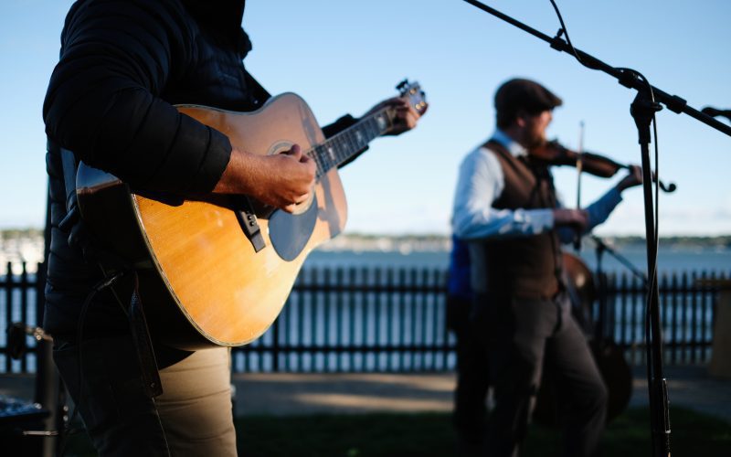 A band playing on the seaside lawn