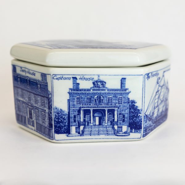 Side view of the delft hexagonal box that shows an image of the Salem Custom House.
