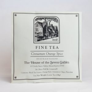 The front side of one package of House of the Seven Gables Assorted Tea. This is the Cinnamon Orange Spice variation. The package has an image of the House of the Seven Gables on it.
