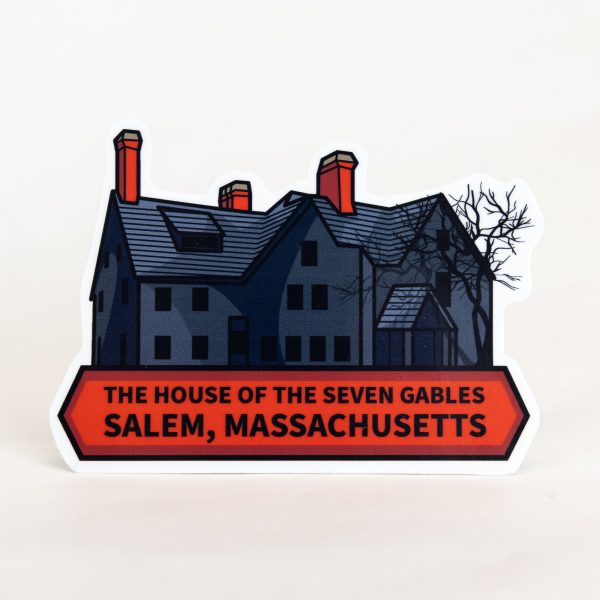 The front of the House of the Seven Gables Sticker. It is a shadowy image of the House of the Seven Gables with a red banner reading, "The House of the Seven Gables, Salem, Massachusetts."